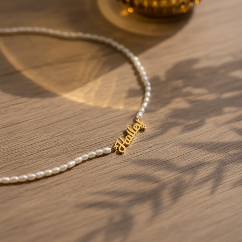 Dainty freshwater pearl collarbone name necklace by Sairahaz