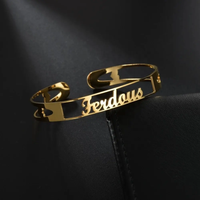 Open cuff name bracelet in gold vermeil with personalized engraving