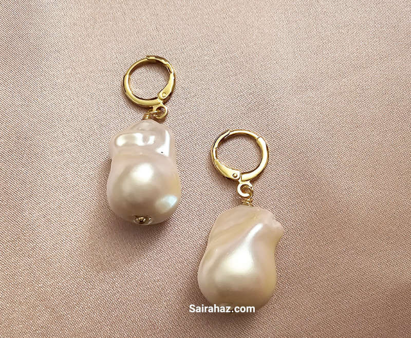 Timeless Beauty Unveiled: Real Baroque Pearl Drop Earrings - Freshwater Elegance at Its Finest Indulge in the allure of our Real Baroque Pearl Drop Earrings, 