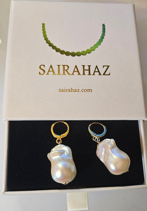 Timeless Beauty Unveiled: Real Baroque Pearl Drop Earrings - Freshwater Elegance at Its Finest Indulge in the allure of our Real Baroque Pearl Drop Earrings, 