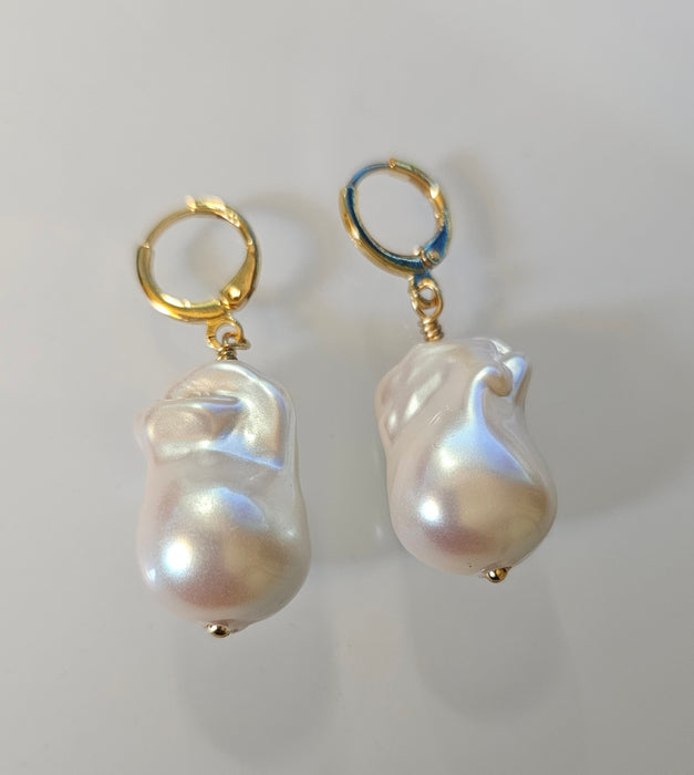 Timeless Beauty Unveiled: Real Baroque Pearl Drop Earrings - Freshwater Elegance at Its Finest Indulge in the allure of our Real Baroque Pearl Drop Earrings, 