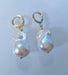 Timeless Beauty Unveiled: Real Baroque Pearl Drop Earrings - Freshwater Elegance at Its Finest Indulge in the allure of our Real Baroque Pearl Drop Earrings, 