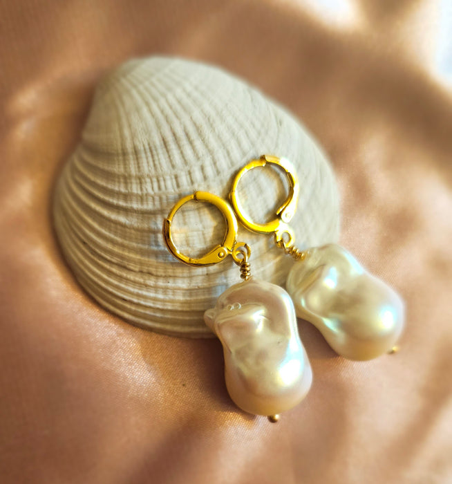 Timeless Beauty Unveiled: Real Baroque Pearl Drop Earrings - Freshwater Elegance at Its Finest Indulge in the allure of our Real Baroque Pearl Drop Earrings, 