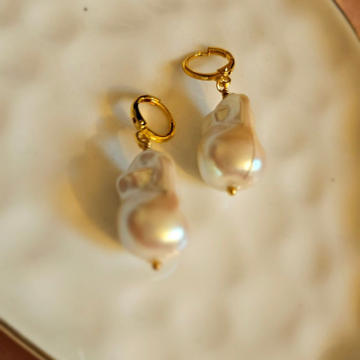 Timeless Beauty Unveiled: Real Baroque Pearl Drop Earrings - Freshwater Elegance at Its Finest Indulge in the allure of our Real Baroque Pearl Drop Earrings, 