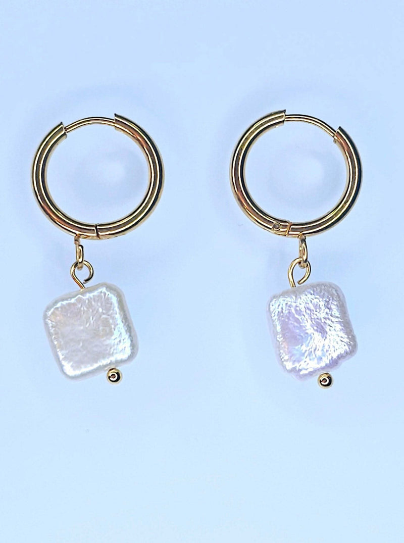 Side view of Natural White Freshwater Baroque Square Hoop Earrings with stainless steel and Akoya pearls