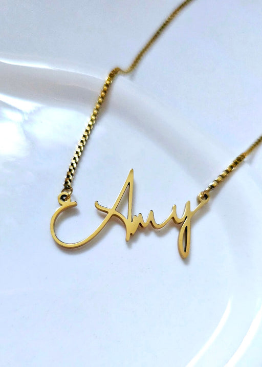 Cursive Custom Name Necklace - The Perfect Giftv for Her. White background name necklace