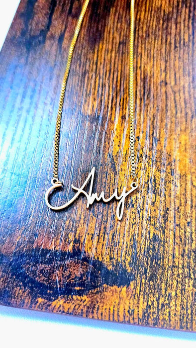 Cursive Custom Name Necklace - The Perfect Giftv for Her on wood