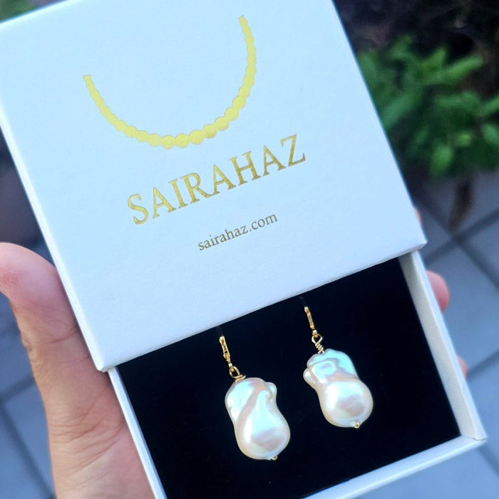 Timeless Beauty Unveiled: Real Baroque Pearl Drop Earrings - Freshwater Elegance at Its Finest Indulge in the allure of our Real Baroque Pearl Drop Earrings, 