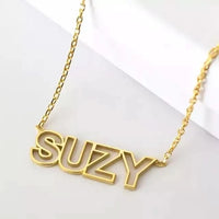 Custom cut out name necklace with polished personalized script pendant