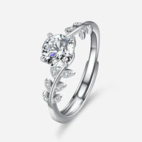 Leaf vine round solitaire ring in sterling silver with nature-inspired detailing