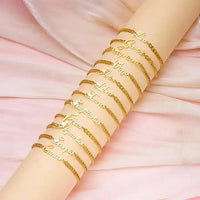 Zodiac charm Cuban bracelet with heart charm and personalized initial detail