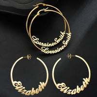 Custom name hoop earrings in 18K gold vermeil by Sairahaz
