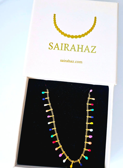 Rainbow Christmas Light Bulb Necklace elegantly packaged in jewelry box