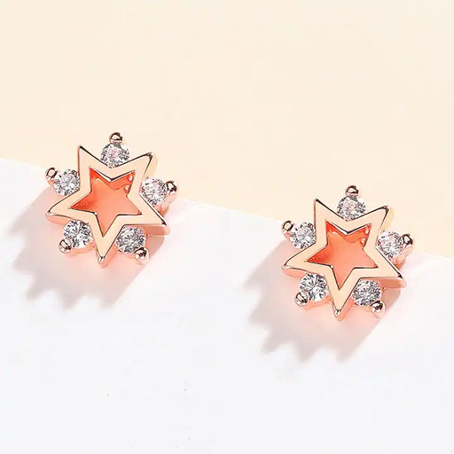 "Sterling Silver Star CZ Stud Earrings: Celestial Elegance with Five Sparkling Gems"